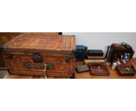 A Portuguese / Spanish leather trunk together with assorted boxes, candlesticks etc