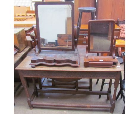 A 20th century oak console table together with two Victorian mahogany toilet mirrors