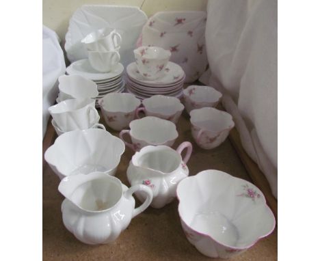 A Shelley Bridal Rose pattern part tea set together with another Shelley bone china part tea set