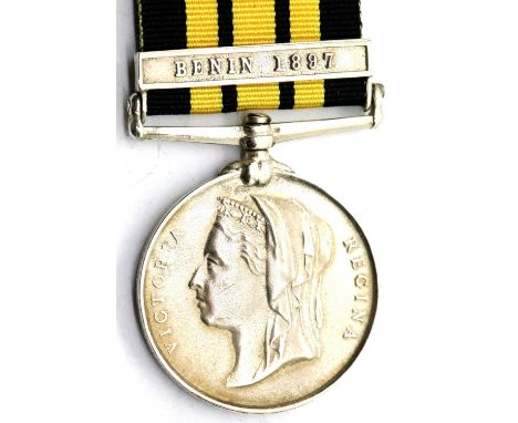 Victorian East &amp; West Africa type medal with Benin 1897 bar (bent), named to C E Marshall Ldg Shipt HMS Theseus, NVF. P&a