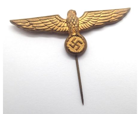 German Third Reich type pressed brass Eagle and Swastika stick pin, W: 5 cm. P&amp;P Group 1 (£14+VAT for the first lot and £