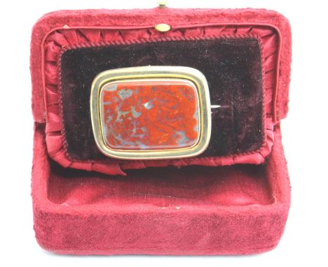 A boxed large Victorian mourning brooch, rectangular form having a large panel of agate, and glazed panel to the reverse disp