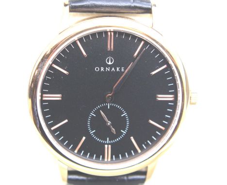 New boxed Ornake gents wristwatch, gold plated case with black dial, with Japanese Miyoto movement, working at lotting. P&amp