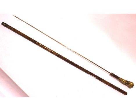 Antique sword stick with a brass Chinese deity handle, blade L: 65 cm, overall L: 92 cm. P&amp;P Group 2 (£18+VAT for the fir