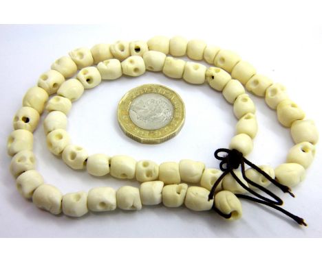 Carved skull bead necklace. P&amp;P Group 1 (£14+VAT for the first lot and £1+VAT for subsequent lots) 
