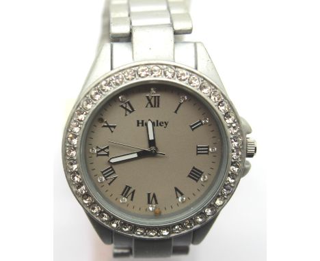 Ladies Henley jewelled quartz wristwatch on an aluminium bracelet. P&amp;P Group 1 (£14+VAT for the first lot and £1+VAT for 