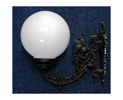 An ornate wall mounted light fitting with shade 19in wide x 19in high