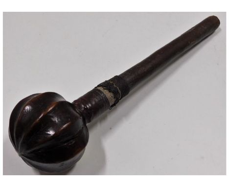 A 19thC. knobkerrie tribal art club with wire &amp; hide handle 13in long