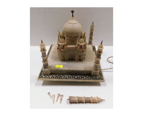 A carved alabaster novelty lamp model depicting possibly the Siddiqa Fatima Zahra Mosque, some faults 9in square