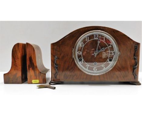 A pair of hard wood bookends twinned with a Westminster Chime mantle clock, runs, when wound 