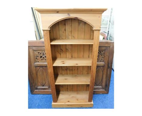 A pine book shelf 58.75in tall x 29in wide x 12in deep