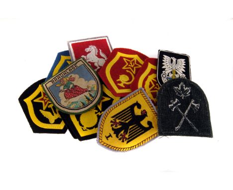 A group of military and other cloth badges, to include US Air Force, US Army, Russian Examples, Police from various countries