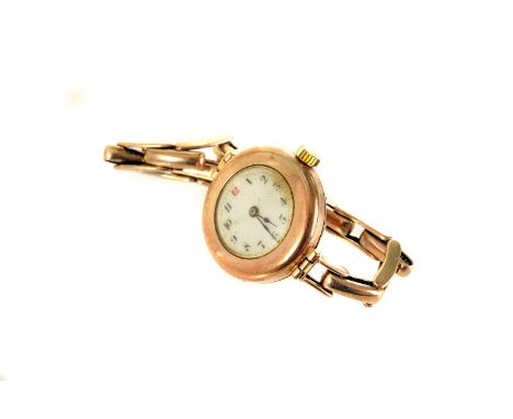 A 9ct gold Art Deco period lady's trench style wristwatch, with enamel dial, AF, marked to case RWCC, on expanding strap, in 