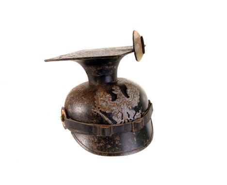 A WWI German Lancers helmet, having white metal badge to front with leather strap, leather liner to inside, marked BJ AM 1917