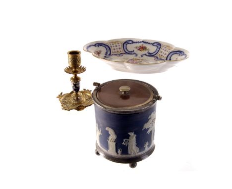 A mixed lot, including a Worcester plate, a Wedgwood biscuit barrel, a Choissy Le Roi plate, and a Victorian brass candlestic
