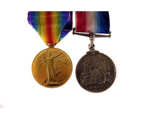 Two early 20th century medals, one a Victorian China medal 1900 awarded to Pte E Trow Royal Marines aboard HMS Humber and his
