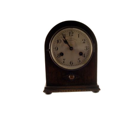A 20th century oak mantle clock, signed Page, Keen and Page, Plymouth to silvered dial, coil gong, 21cm high