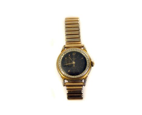 A 1950s Anker gentleman's dress wristwatch, having black dial surrounded by paste stones, manual wind movement, on later expa