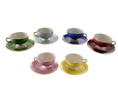 A multi-colour Bavarian porcelain coffee set comprising ten demi-tasse cups, and 14 saucers, plus two 20th century Minton tet