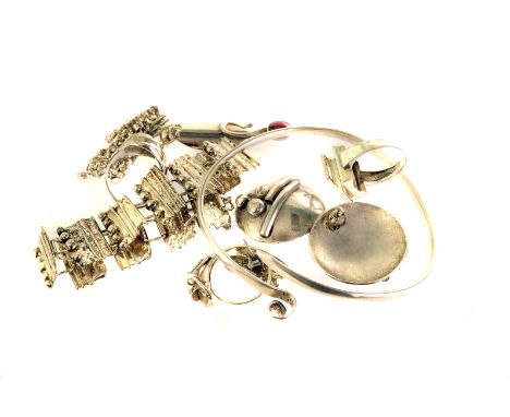 A group of silver and white metal well desiged jewellery, including a bracelet and matching earrings, a pendant on chain, a p