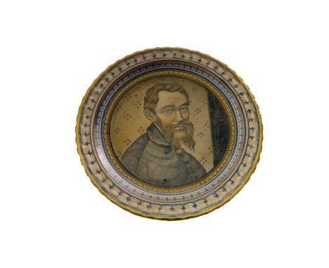 A maiolica cabinet plate,  painted to the centre with the portrait of Michelangelo, verso signed 'G.O', 19cm diameter