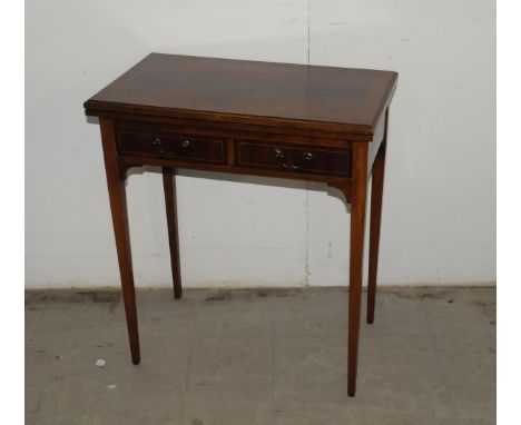 A reproduction mahogany card table, having two drawers below hinged top with band of inlaid light wood, approx 68cm wide, AF