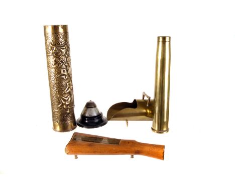 A selection of various trench art, together with a cribbage board made up of a stock of a rifle, plus a missile fuse inkwell 