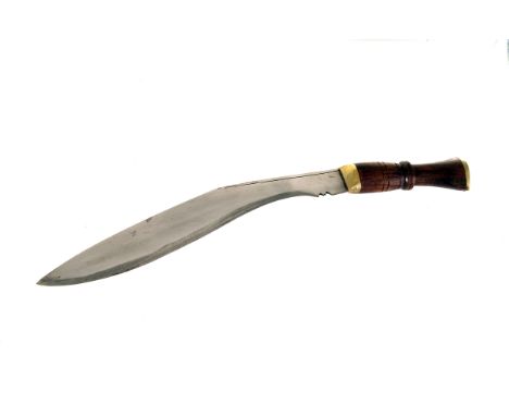 A 1950s Kukri knife, having leather and white metal tip scabbard, including the Charmak and Karda