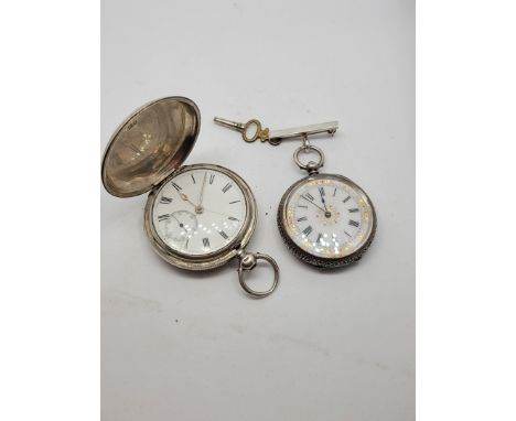 A silver cased full hunter pocket watch, with white enamel dial, Roman numerals and second subsidiary dial, London, 1874, 91g