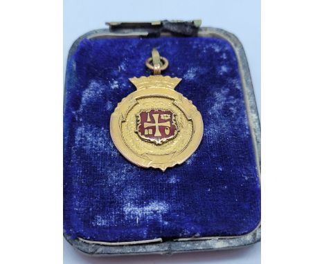 A 9ct gold and enamel fob medal, named "WABL 1925 R. Briggs" to reverse, 6.3g, with AF box.