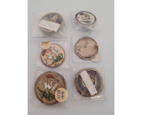A collection of Georgian and Victorian enamel coins, including Crowns and Half Crowns with later brooch mounts (6)