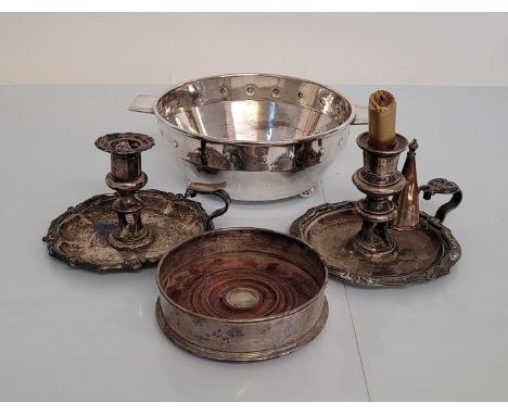 A silver plated twin handled Art Deco bowl, together with a silver and mahogany wine bottle coaster and two Sheffield plate c