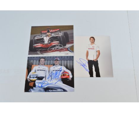 Formula One signed photographs, including Michael Schumacher and Nico Rosberg, Jensen Button and Lewis Hamilton. Each image 2