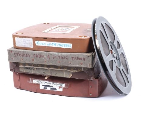 Four 16mm Feature Films, in cases with titles marked, The Cassandra Crossing, Touch of the Masters, Stories from Flying Trunk