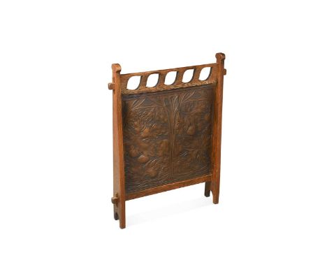 Liberty & Co., an Arts & Crafts tooled leather and oak fire screen, the panel below a pierced rail and embossed with a whipla