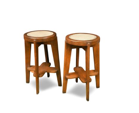 Pierre Jeanneret (1896-1967) for Chandigarh,  a pair of caned teak stools, circa 1965, each with a dished circular seat raise
