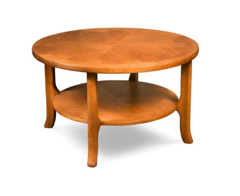 A mid-century teak 'Cog' coffee table by Nathan Furniture, the circular top with a geometric border above a circular undertie