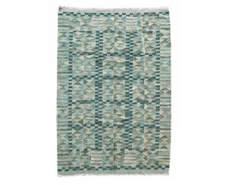 In the manner of Barbro Nilsson, a kilim flat-weave wool carpet,  of recent manufacture, woven in tones of green      In very