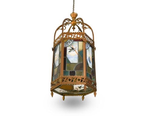 An Aesthetic Movement stained glass hall lantern, of hexagonal form, the facets each inset with coloured glass quarries centr