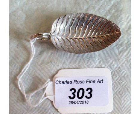 A late 18th century silver leaf form caddy spoon with tendril handle, Birmingham 1799 by Joseph Taylor. Condition Report: No 