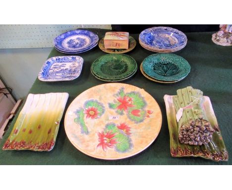 A 34cm diameter Royal Doulton water lily charger, together with two Italian asparagus dishes and an Italian asparagus dish an