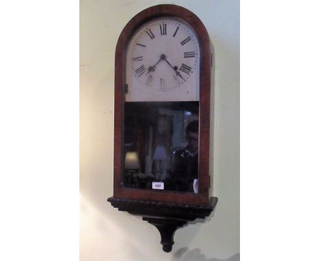 An Edwardian mahogany cased wall clock, the gong striking eight day movement faced by painted Roman dial in an arched case wi