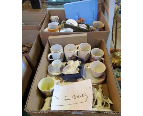 Two boxes of decorative ceramics, including: crestedware, commemorative pieces, Motto Ware, a reproduction cow creamer, Meers