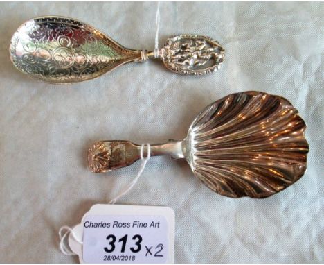 Two silver caddy spoons, to include: a Victorian silver broad shell moulded caddy spoon, Newcastle 1845, together with a cast