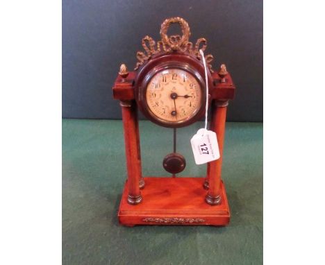 A 19th century mahogany Portico clock, the drum head case with German movement faced by painted Arabic dial, 28cm.