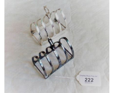 A matched pair of silver angular melba toast racks, one by Elkington & Co of Birmingham, various dates and makers.