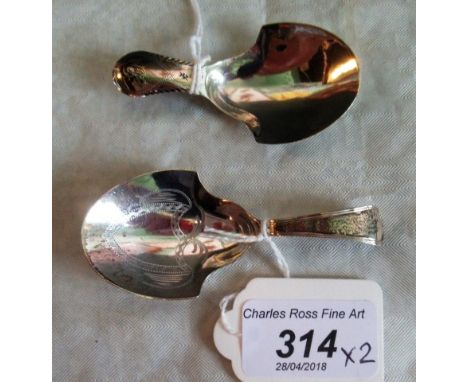 Two George III silver caddy spoons of simple pressed spade form, to include Birmingham 1800 by Joseph Taylor. Condition Repor