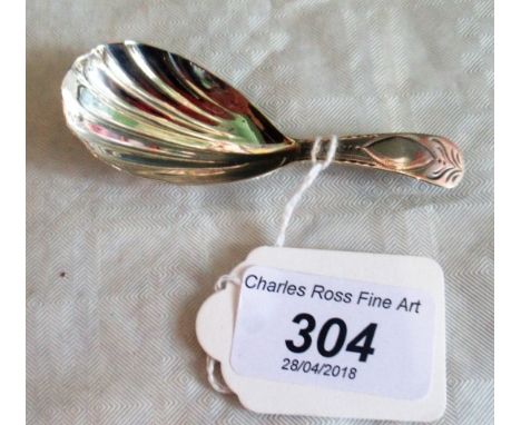 A late 18th century scallop shell bowl caddy spoon with cartouche slip handle, London 1797, by George Wintle. Condition Repor