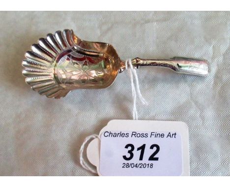 A George IV silver moulded bowl caddy spoon, with blow moulded handle, Birmingham 1822 by Joseph Taylor. Condition Report: Sm