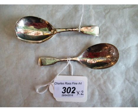 Two George IV silver fiddle pattern caddy spoons, with ovoid bowl and floral engraved decoration, London 1824, one by William